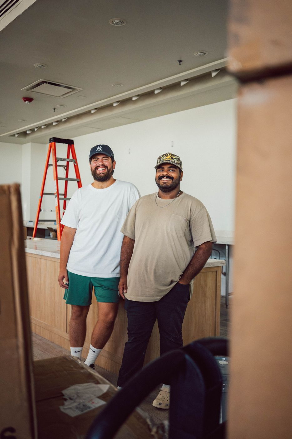 Ricky and David at the Weekday counter during buildout